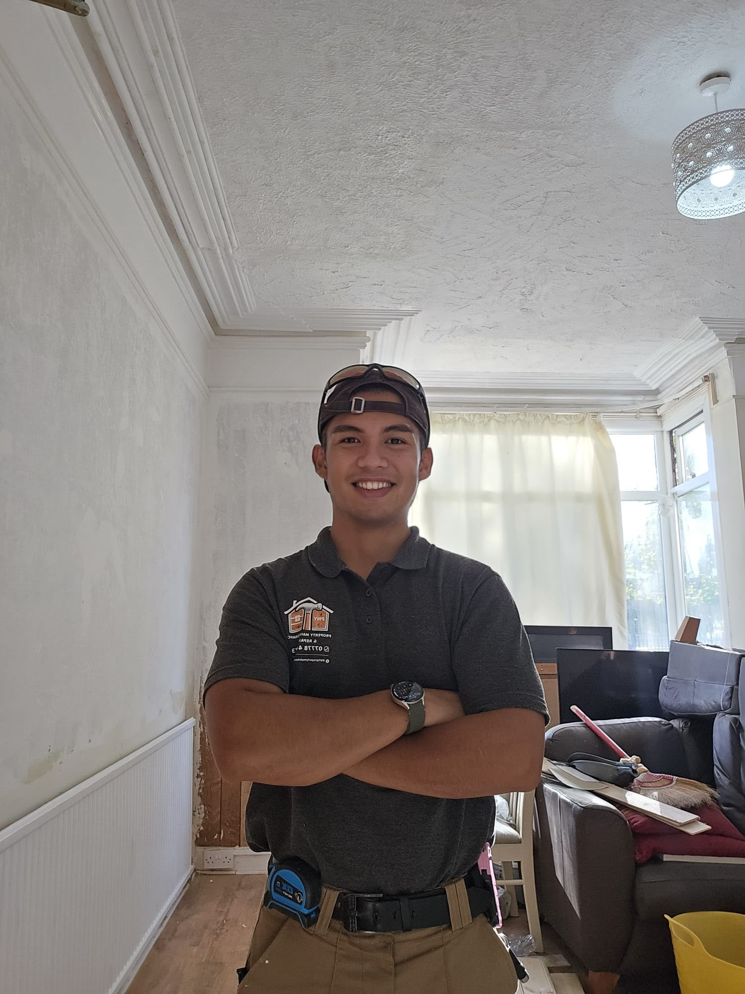 Jasper from PNY Property Maintenance in workwear at a renovation project